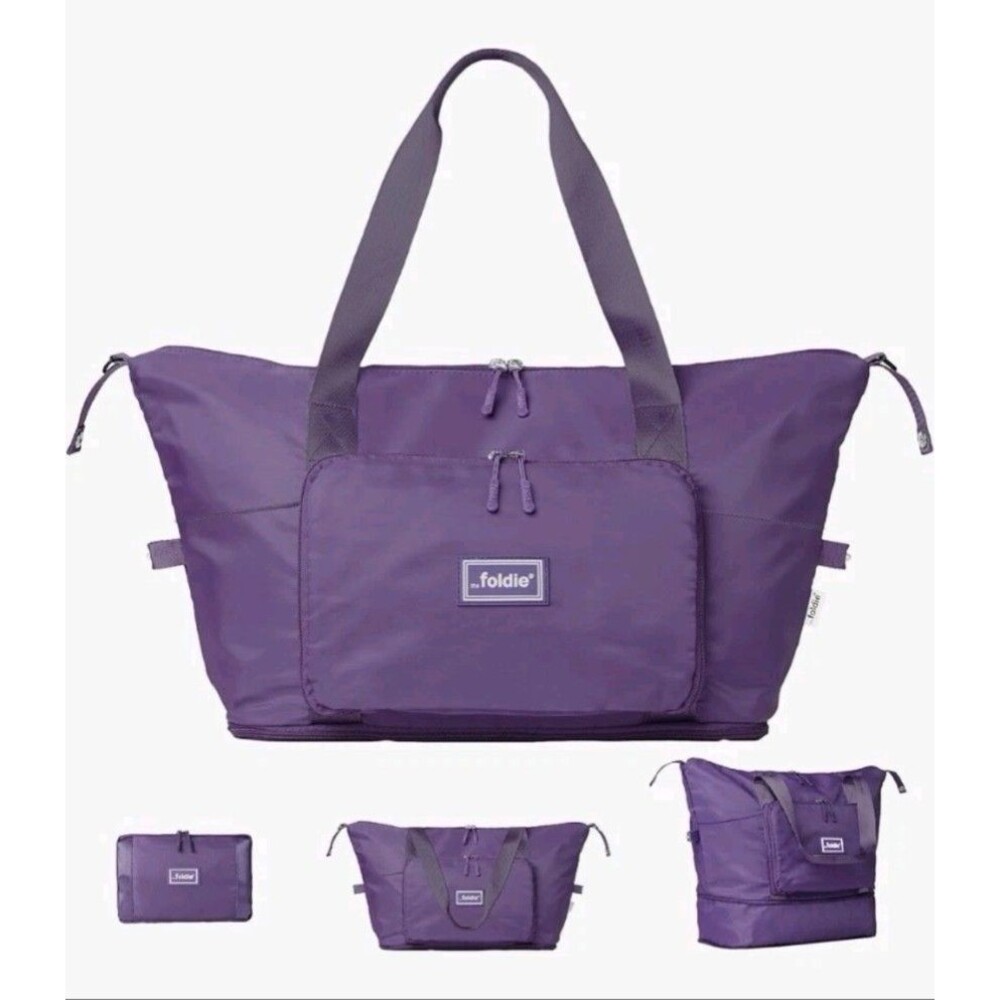 The Foldie Women’s Foldable Travel Bag 15” Purple Multi Pocket Expensable NWT